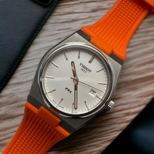 FKM Tissot PRX Rubber Band in Orange from Watch Straps Canada monté sur une Tissot PRX