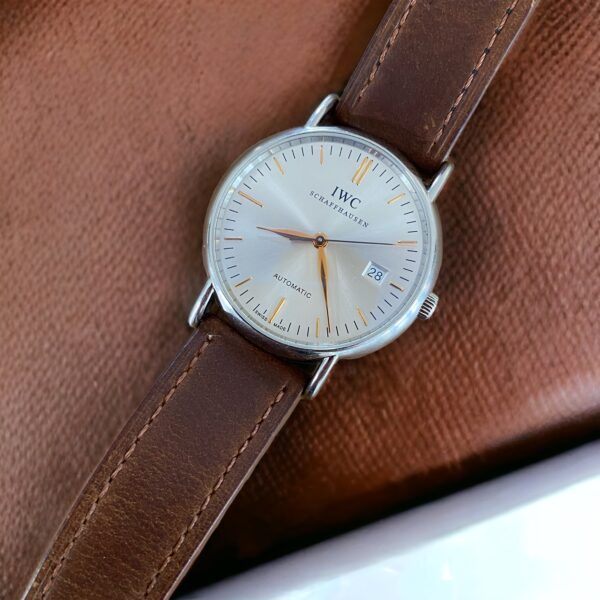 IWC watch mounted on worn vintage leather strap